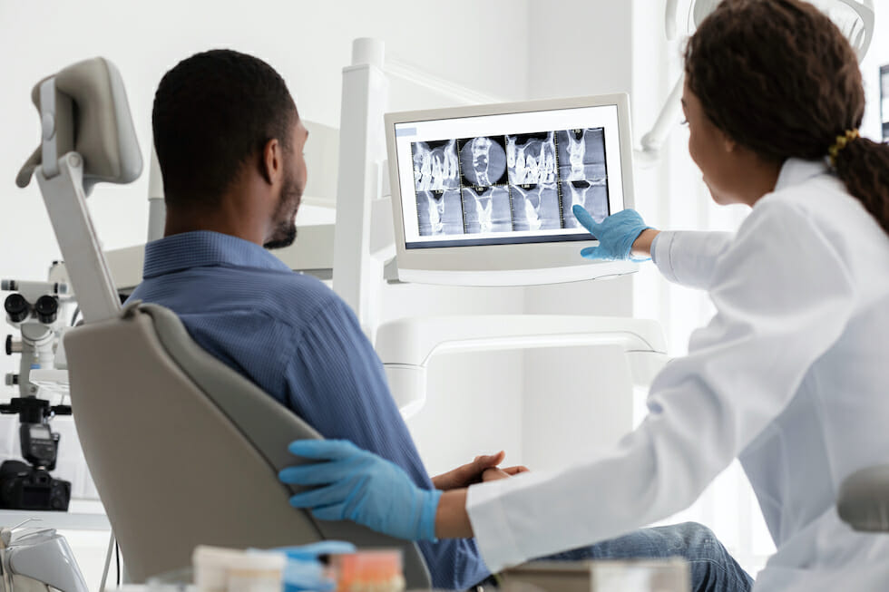patient and dentist reviewing xray